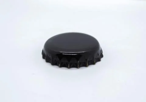 Black cap from a beer bottle without text on a white background Stock Photos