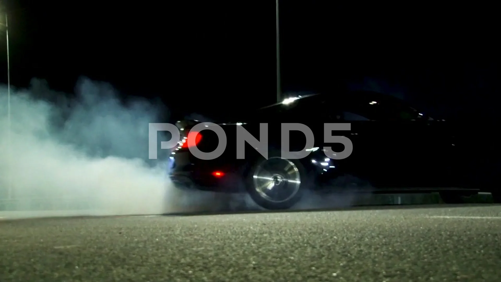 black car drifts at night clouds of dust... | Stock Video | Pond5