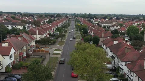 Black car drive on left side with town panorama in UK 스톡 동영상 161271085
