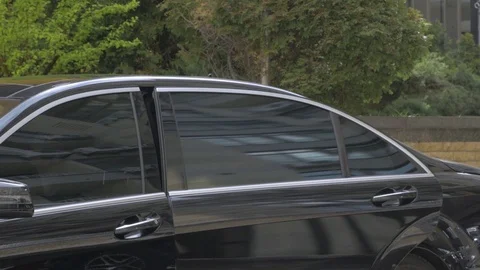 The Black Car Drives Off Stock Footage 125696532