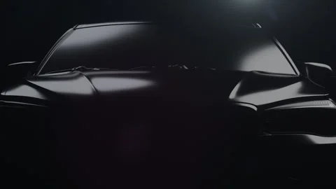 A black car with a dynamic backlight that forms glare on the car body Stock-Footage 273475011