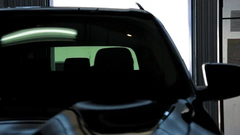 Black Car in a Garage Stock Footage 76471278
