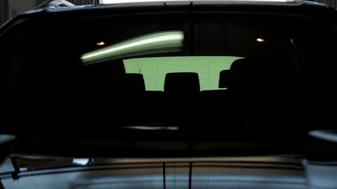 Black Car in a Garage Stock Footage 76471455