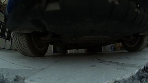 Black Car in a Garage Stock Footage 76471924