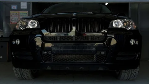 Black Car in a Garage Stock Footage 76471945