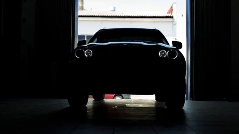 Black Car in a Garage Stock Footage 76471955