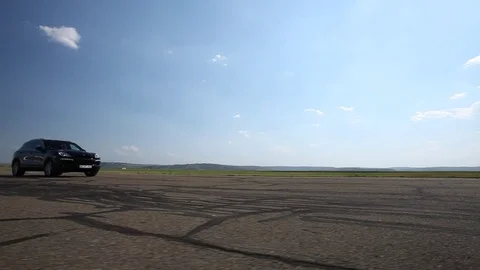 Black Car in motion Stock Footage 76769543