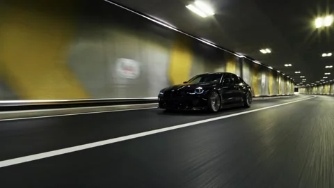 Black car speeding with motion blur effect on an underground road Stock-Footage 341957839