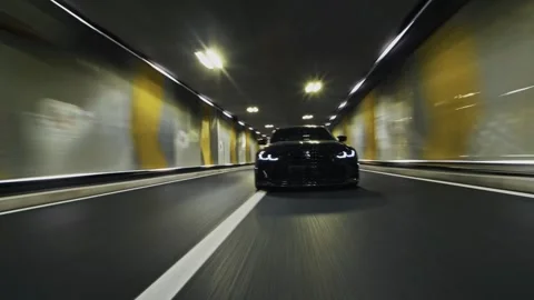 Black car speeding with motion blur effect on an underground road Stock-Footage 341957959