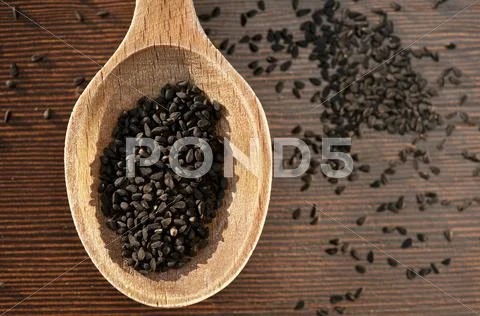 Black Caraway Seeds On A Wooden Spoon (Seen Above)