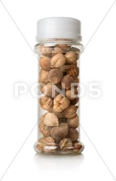 Black cardamom in a glass jar Stock Photos
