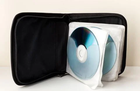 Black Case for CD and DVD on white background. Technology from the 90s. Stock-Fotos