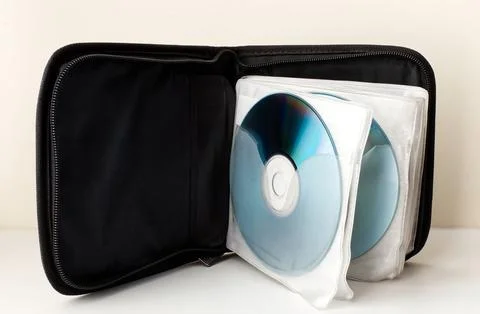 Black Case for CD and DVD on white background. Technology from the 90s. Stock Photos