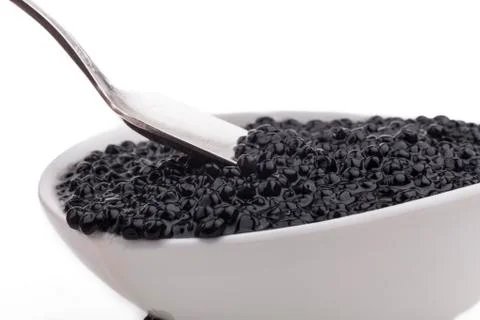 Black caviar beads Stock Photos