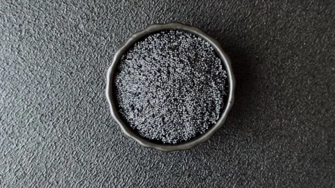 Black caviar from beluga or sturgeon, an expensive delicacy for sandwiches. Blac Stock Footage 336926565