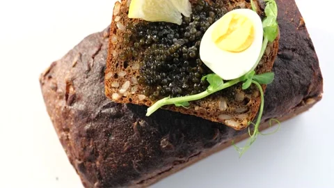 Black caviar served on bread Stock-Footage 150509620