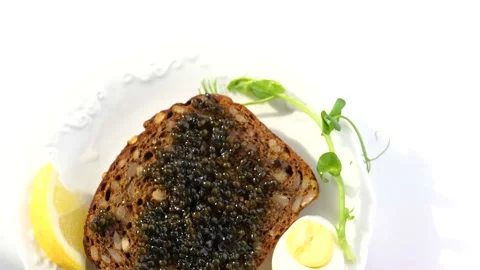 Black caviar served on bread Stock-Footage 150510197