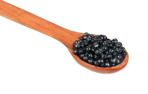 Black caviar in spoon Foto stock