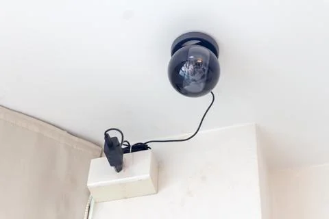 Black CCTV camera in the house Stock Photos