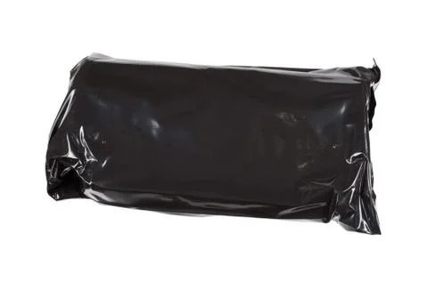 Black cellophane pack isolated on white background Stock Photos