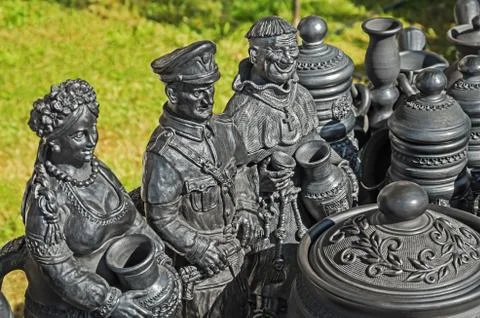 Black ceramic folk figures Stock Photos