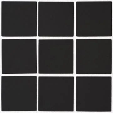 Black ceramic tile with 9 squares in rectangular form with white filling Stock Photos