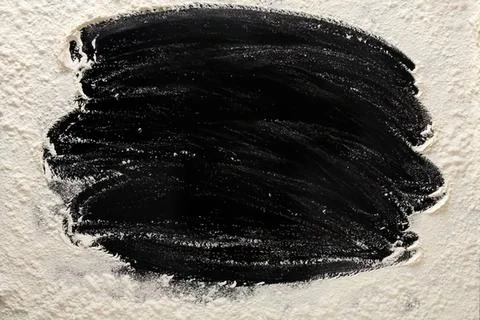 Black chalk scribble on textured paper Stock Photos