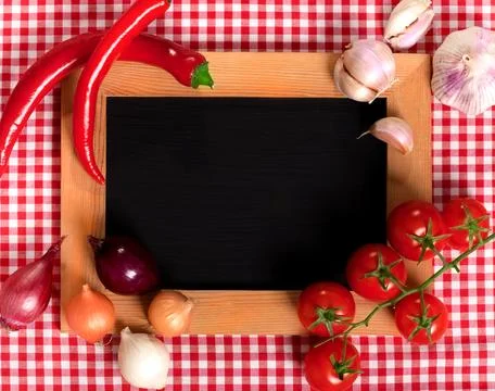 Black chalkboard for menu on a table cloth Stock Photos