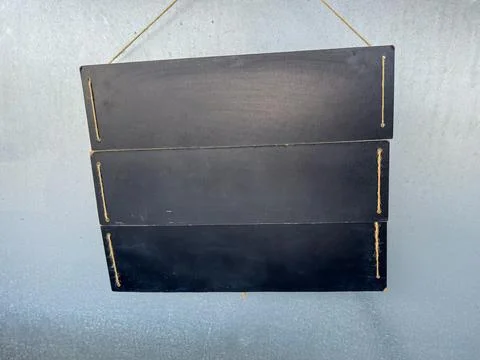 Black chalkboard with three sections Stock Photos