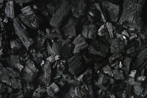 Black charcoal background Stock Photos