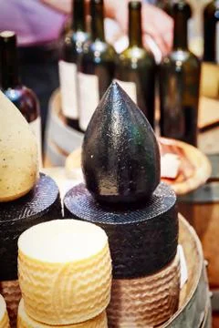 Black cheese and different types of delicious cheese Stock Photos