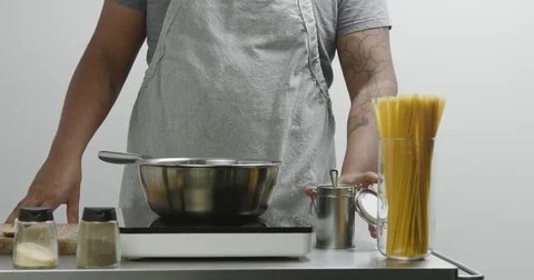 Black chef boiling spaghetti, close up Stock Footage 81615274
