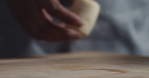 Black chef hand makes a roll of dough Stock Footage 75193450