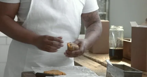 Black chef makes a pastry ball Stock Footage 75189620