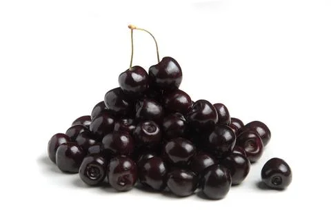 Black cherries isolated on white background macro view Stock Photos
