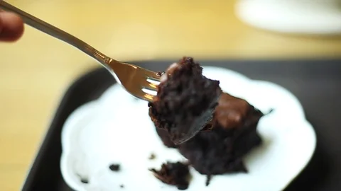 Black chocolate brake by fork Stock Footage 94440011