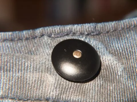 Black circle button macro close up detail clothing Stock Photos