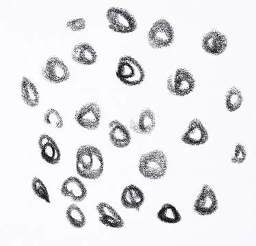 Black circles and spots drawn with pencil, chaotic graphic pattern on white.. Stock Illustration
