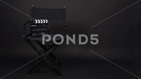 Black clap board and director chair use in video production , movie ,film, ci Stock-Fotos
