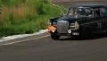 Black classic Mercedes Benz 300 SE turning on the road HD Footage