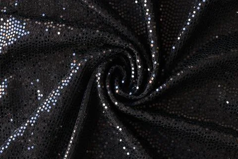 Black cloth with shiny sequins abstract background Stock Photos