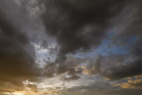 Black cloud on sunset dramatic dark sky background Stock Photos