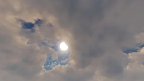 Black clouds cover the sun and the weather is from sunny to yin Stock Footage 283794950