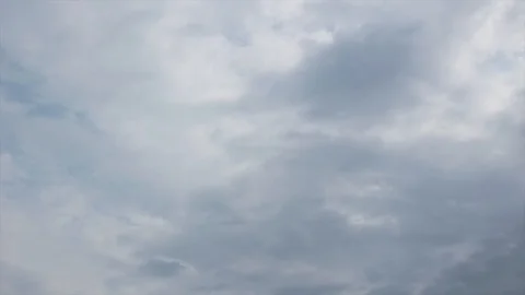 Black clouds floating under the blue sky Stock Footage 115541497