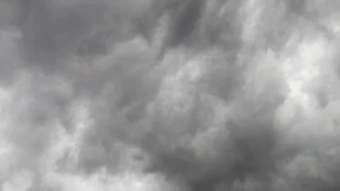 Black clouds gather in large groups, moving slowly to signals, the hard rain Stock Footage 318261571