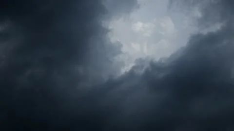 Black clouds move quickly covering the earth Video stock 272632497
