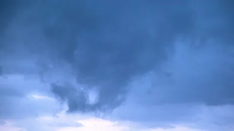 Black Clouds Move with Wind in a Stormy Day at Sunset Stock Footage 146206482