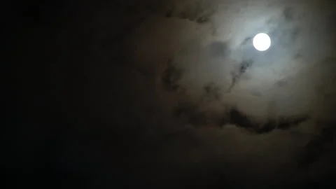 Black clouds rush over the moon Stock Footage 249216396