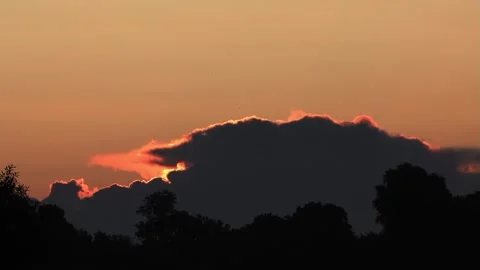 Black clouds sunrise Stock Footage 247444038