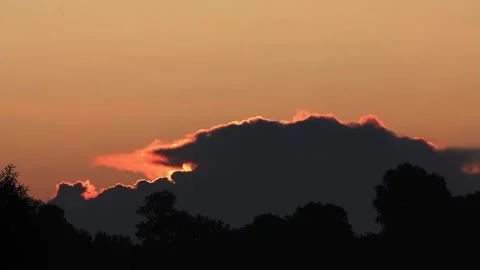 Black clouds sunrise Stock Footage 247488080